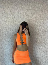 Load image into Gallery viewer, Orange Cici Cut Out Mini Skirt
